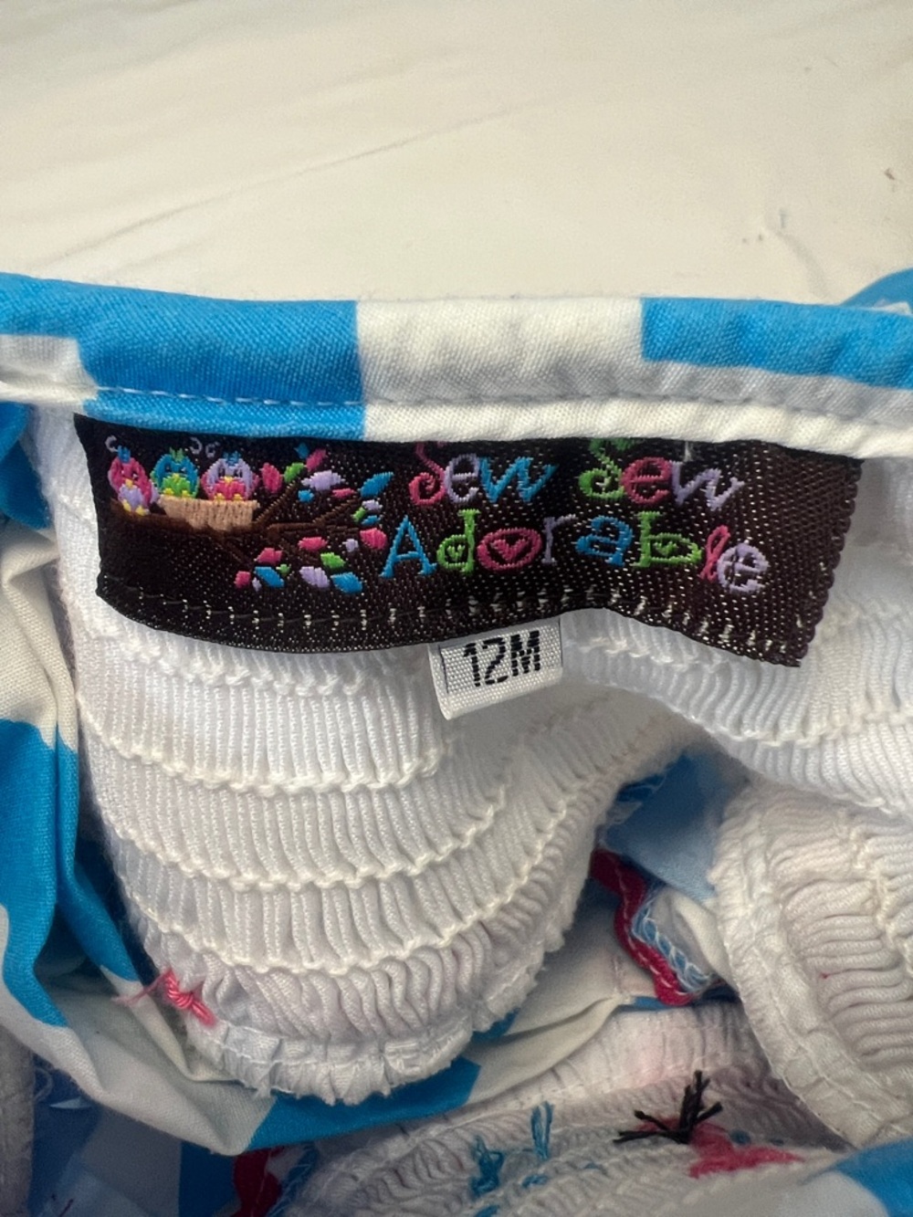 Blue Chevron Smocked Girls Dress with Pink Polka Dot Trim - Picture 5 of 7